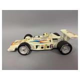Lionstone white number 6 Bobby Unser racecar chip in spoiler