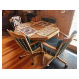 Octagonal dining table with one extra leaf plus four chairs