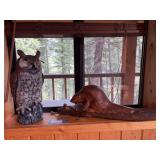 Carved wood beaver and heavy plastic weighted owl