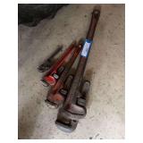 Four pipe wrenches