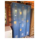 Three section blue metal lockers - with some contents, mostly outdoor clothing