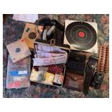 Fly Tying set, assorted targets, 12 gauge shotgun shells, hearing protection, leather ammo holders, buck knife, sheath, set of binoculars