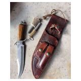 Homemade knife with leather sheath that includes firestarter and wet stone +2 additional fire starters