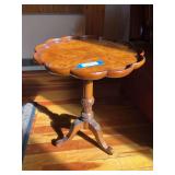 Small scalloped edge, three footed side table