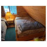 Queen size bed with solid wood frame, and wooden nightstand with lamp - steep stairs! (unsure if two posters will be included/found)