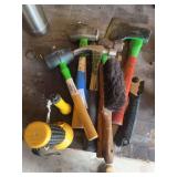 Hand tool assortment includes folding saw, rubber mallet, maul, shop bench brush, hatchet, hammers