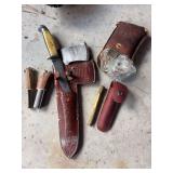 Western knife camping kit includes knife and hatchet with leather sheath two fire starters plus brass firestarter with sheath and Smith EZ sharpener bag with 300 win mag bullets