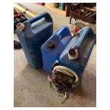 Three water jugs one with pump