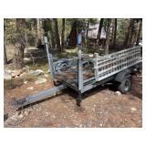 Small utility trailer with ATV ramps 4’ 6” x 10’
