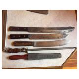 Three extra large kitchen knives, extremely sharp plus steel and sharpener stone