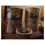 Hand carved logs with cowboy face and nut  picking set