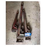 Three pipe wrenches