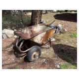 Concrete wheelbarrow ready for its next life as a planter in your garden!