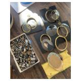 Four small photo frames and large assortment of buttons