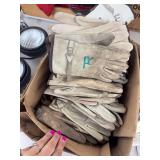 Box full of leather gloves size M