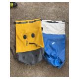 Two large dry bags the yellow is a backpack style