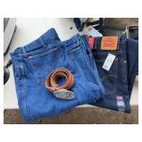 Three pair of jeans, two wranglers 42 x 34, and Levi 40 x 30 with leather belt