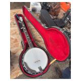 Pickin and Grinin’ Key brand banjo with hard case