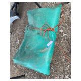 Rubberized truck tarp approximately 20 feet