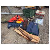 Life jacket coat, kayak oars, raft net, fish basket, fishing poles, tacklebox, gun stock, and fold up chair