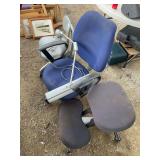 Three office chairs, and vintage work light