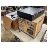 ￼ 13 inch color television new in box plus RCA video cassette recorder and large box of empty DVD cases, and a small assortment of vinyl records