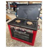 Outdoor Camp oven by Camp Chef propane powered with two burners on top - electric start