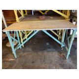 24x60x38 potting table, green legs One side is broken