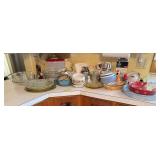 Coffee mugs, canisters, Tupperware, clear glass, etc