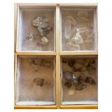 Drawer full of crystals, including clear, smoky and purple