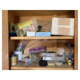 Contents of cupboard fishing, lure, and jig making - assortment bin full also