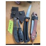 Oyster shucker, browning hatchet, folding knife, and saw