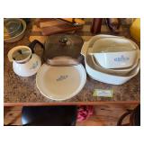 Corningware, cornflower blue casserole dishes, pie plate, and coffee pot