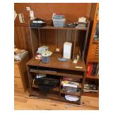 Small typing desk with HP printer, DVD player, some CDs and various office supplies