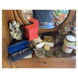 Dresser type collectibles, including two large carved jade pieces, alcohol lamp, letter opener, romance viewer, etc.
