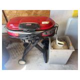 Coleman road trip propane grill and propane tank