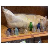 Large assortment of inkwells and small bottles