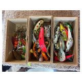 Three small boxes of fishing lures