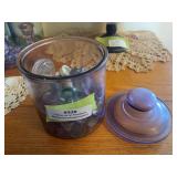Purple glass Tobacco jar full of lots of glass bottle stoppers