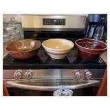 Three crock bowls