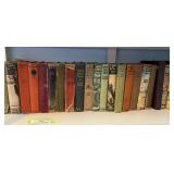 Shelf full of vintage reading novels, nearly all Zane Gray