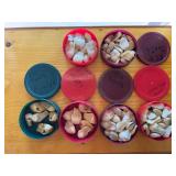 Six containers of elk ivories
