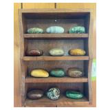 Small shelf with polished rocks