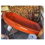 Sport Yak 3 Orange plastic flat bottom boat and wooden oars