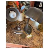 Antique desk lamps and large brass token ￼
