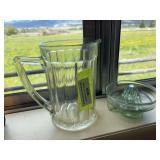 Green glass, new standard Corp. juice reamer, and juice pitcher