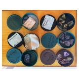 Six canisters of gemstones