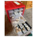 Four drawer container, full of petrified wood and pinecones