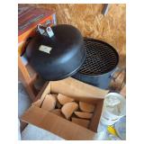 Smoker grill with large box of wood chunks