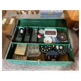 Tacklebox, full of fly fishing reels and flies